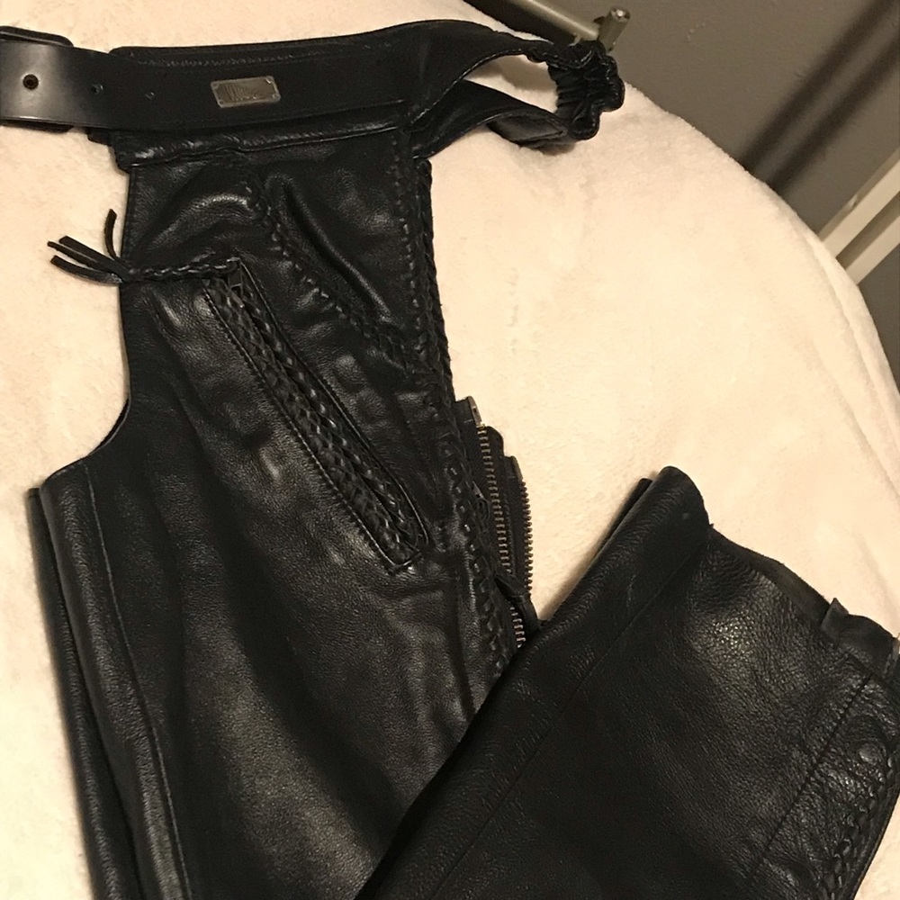 Leather chaps and leather Harley belt purse.